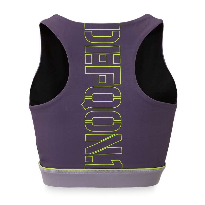 Purple Defqon.1 sports bra with green text on a white background